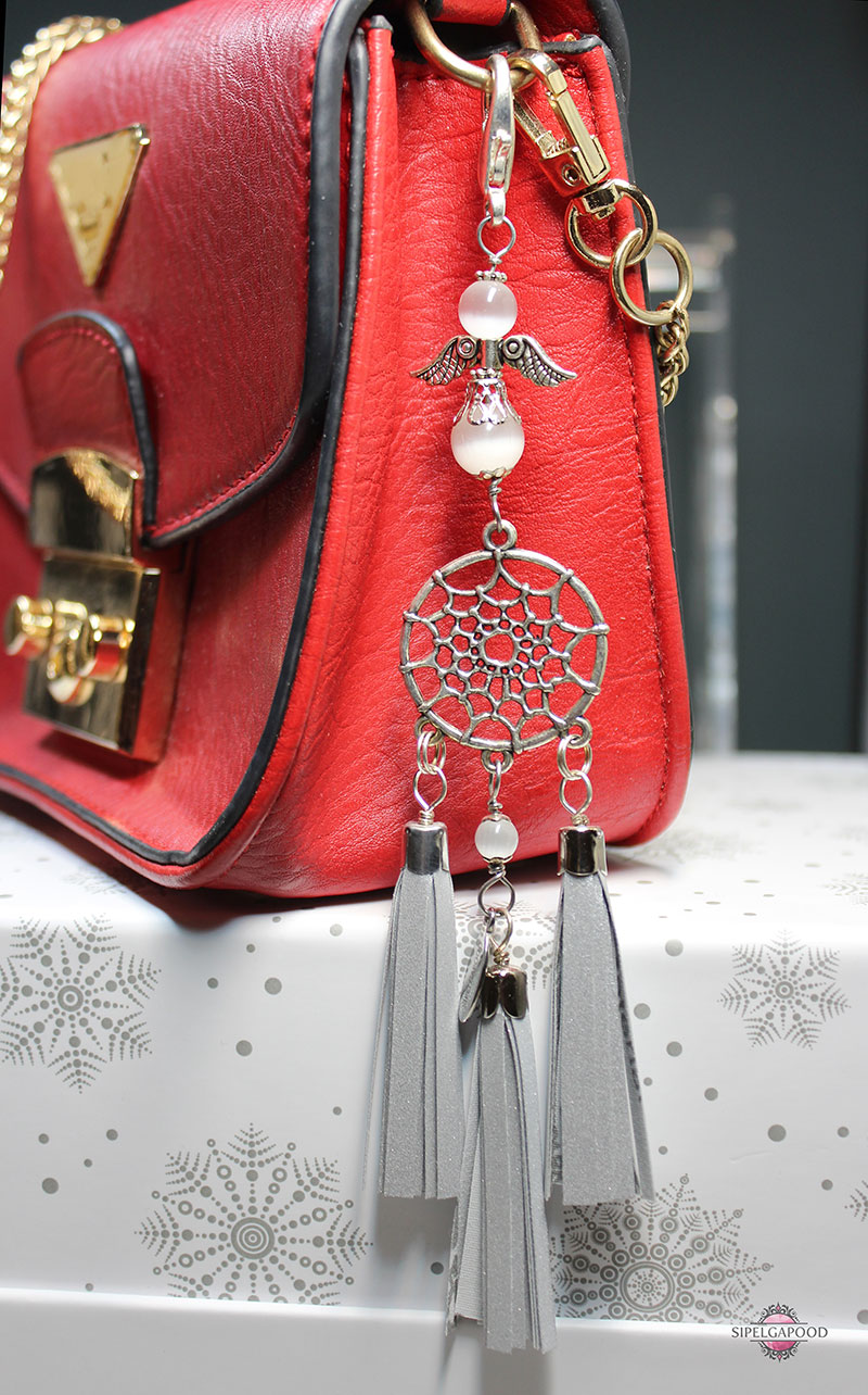 Valge kassisilma ja unenäopüüdjaga helkur-ripats - Image 2