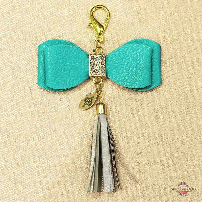 Kunstnahast türkiisivärvi lipsuga helkur-ripats - Image 2