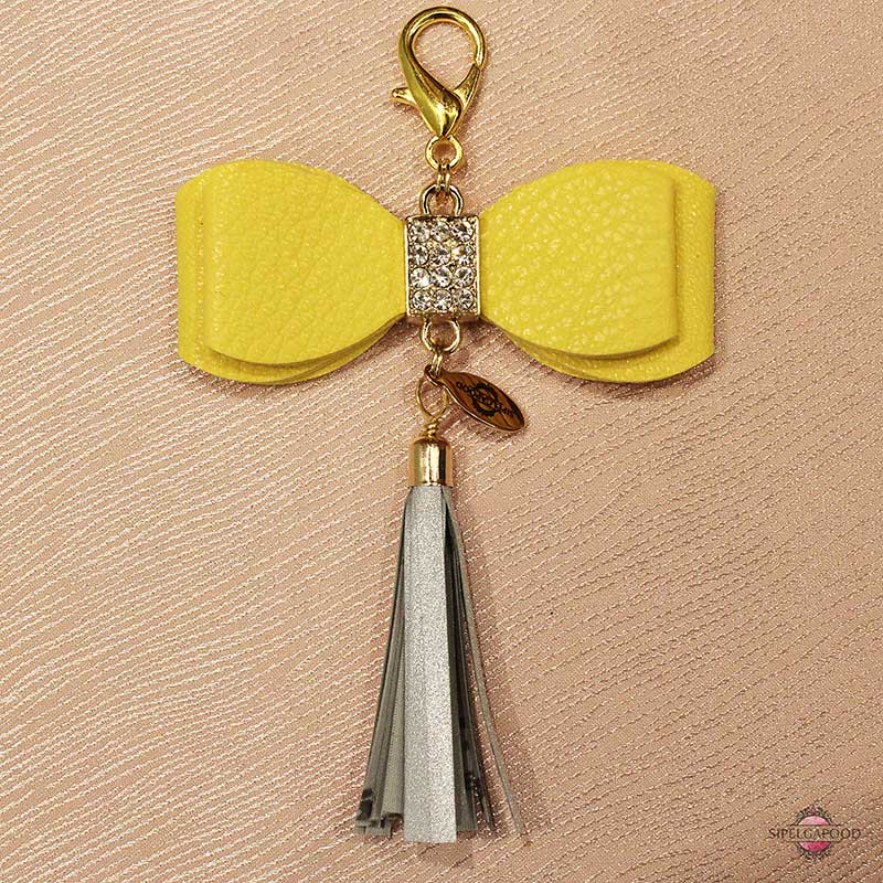 Kunstnahast kollase lipsuga helkur-ripats - Image 2