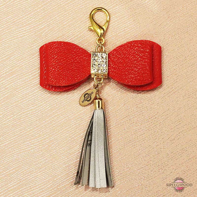 Kunstnahast punase lipsuga helkur-ripats - Image 2