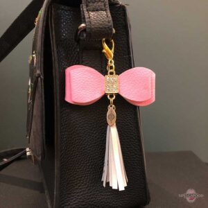 Kunstnahast roosa lipsuga helkur-ripats