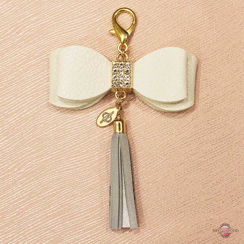 Kunstnahast valge lipsuga helkur-ripats - Image 2